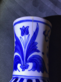 A Chinese blue and white bottle vase with figures in a landscape, Transitional period