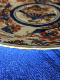 Four Chinese Imari-style plates with raised central roundels, Kangxi