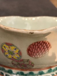 A pair of Chinese famille rose jardini&egrave;res and two celadon bowls, 19th C.