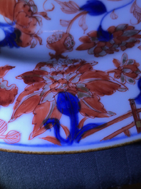 Four Chinese Imari-style plates with raised central roundels, Kangxi