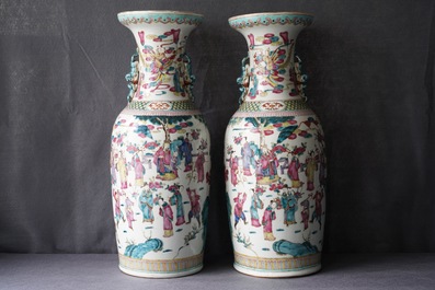A pair of Chinese famille rose 'immortals' vases, 19th C.