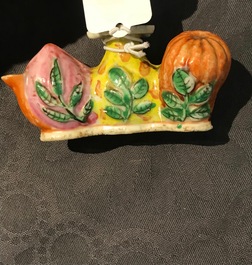 A Chinese famille rose flower-shaped brush washer and a brush rest, 19th C.