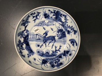 A Chinese blue and white plate with a deer and a monkey, Chenghua mark, Kangxi/Yongzheng