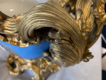 A pair of massive gilt bronze-mounted S&egrave;vres porcelain ewers and a jardini&egrave;re, France, 19th C.