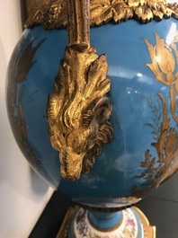 A pair of massive gilt bronze-mounted S&egrave;vres porcelain ewers and a jardini&egrave;re, France, 19th C.