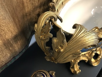 A pair of massive gilt bronze-mounted S&egrave;vres porcelain ewers and a jardini&egrave;re, France, 19th C.