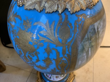 A pair of massive gilt bronze-mounted S&egrave;vres porcelain ewers and a jardini&egrave;re, France, 19th C.