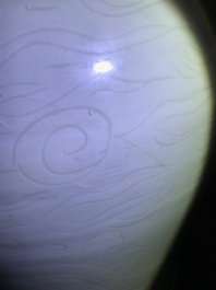 An incised Chinese celadon-glazed Swatow vase, Ming