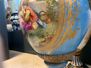 A pair of massive gilt bronze-mounted S&egrave;vres porcelain ewers and a jardini&egrave;re, France, 19th C.