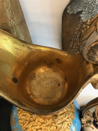 A pair of massive gilt bronze-mounted S&egrave;vres porcelain ewers and a jardini&egrave;re, France, 19th C.