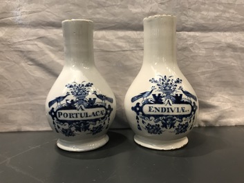 Four Dutch Delft blue and white pharmacy bottles and two jars, 18th C.