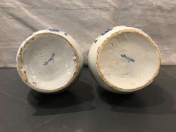 Four Dutch Delft blue and white pharmacy bottles and two jars, 18th C.