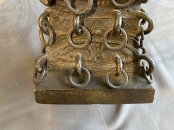 A Chinese archaistic ringed bronze fanggu vase, Ming