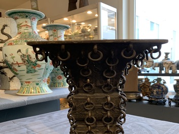 A Chinese archaistic ringed bronze fanggu vase, Ming