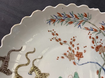 A pair of lobed Chinese famille verte Kakiemon-style 'tiger' plates, Kangxi