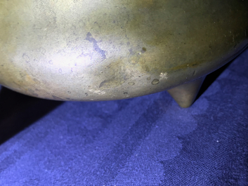 A Chinese bronze tripod censer, Qianlong mark, 19th C.