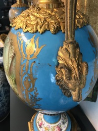 A pair of massive gilt bronze-mounted S&egrave;vres porcelain ewers and a jardini&egrave;re, France, 19th C.