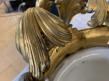 A pair of massive gilt bronze-mounted S&egrave;vres porcelain ewers and a jardini&egrave;re, France, 19th C.