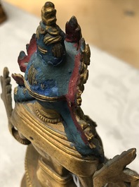 A Chinese gilt bronze figure of Amitayus, 17/18th C.