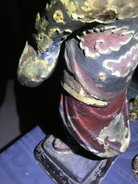 Une grande figure d'un gardien en bronze et polychromie, Chine, Ming