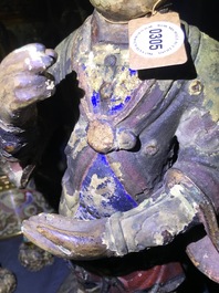 Une grande figure d'un gardien en bronze et polychromie, Chine, Ming