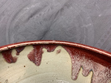 Quatre bols en porcelaine de Chine sang de boeuf, 19/20&egrave;me