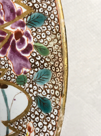 A Holitsch faience famille rose-style chinoiserie plate, Hungary, 18th C.