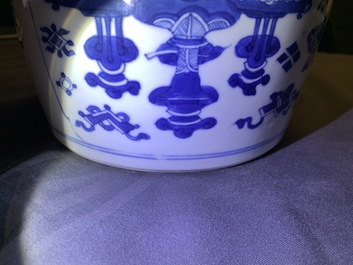 A Chinese blue and white bowl and cover with antiquities design, Kangxi