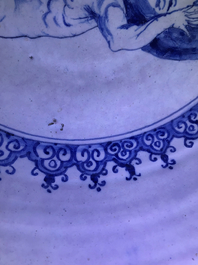 A fine and large Dutch Delft blue and white 'maritime subject' bowl depicting Atlas, 18th C.
