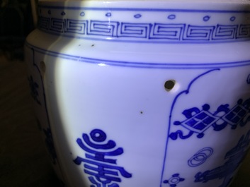 A Chinese blue and white bowl and cover with antiquities design, Kangxi