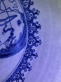 A fine and large Dutch Delft blue and white 'maritime subject' bowl depicting Atlas, 18th C.