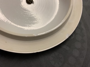 A Chinese blue and white bowl and cover with antiquities design, Kangxi
