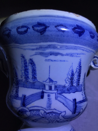 A pair of small Dutch Delft blue and white 'campana' vases on stands, 18th C.