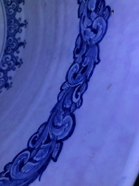 A fine and large Dutch Delft blue and white 'maritime subject' bowl depicting Atlas, 18th C.