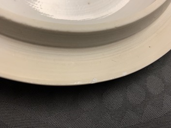 A Chinese blue and white bowl and cover with antiquities design, Kangxi
