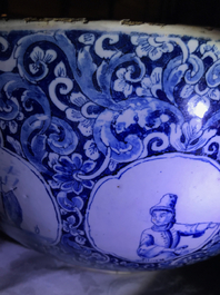A fine and large Dutch Delft blue and white 'maritime subject' bowl depicting Atlas, 18th C.