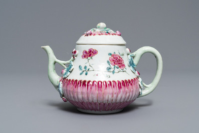 Two Chinese famille rose relief-moulded 'lotus' teapots and covers, Yongzheng
