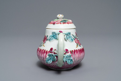 Two Chinese famille rose relief-moulded 'lotus' teapots and covers, Yongzheng