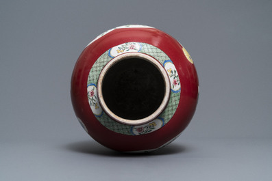 A fine Chinese famille rose ruby ground baluster vase with floral panels, Yongzheng