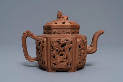 A Chinese Yixing stoneware reticulated teapot and cover, Kangxi