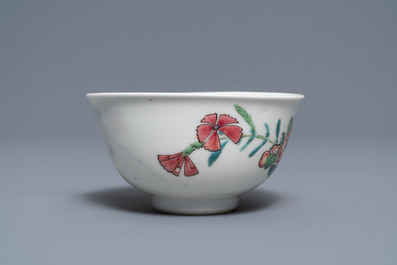 A fine Chinese famille rose cup and saucer with floral design, Yongzheng