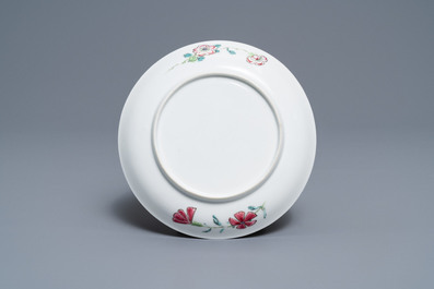 A fine Chinese famille rose cup and saucer with floral design, Yongzheng