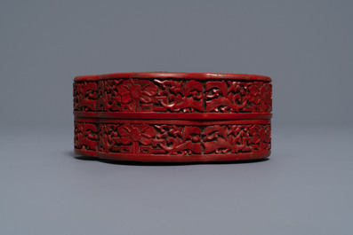 A Chinese carved cinnabar lacquer box and cover, Wanli mark, 18/19th C.