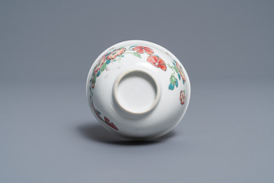 A fine Chinese famille rose cup and saucer with floral design, Yongzheng
