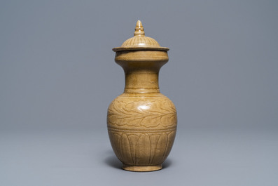 A Chinese brown-glazed vase and cover with incised design, Song