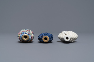 Six Chinese famille rose, blanc de Chine and faux-lapis lazuli relief-decorated snuff bottles, 19/20th C.