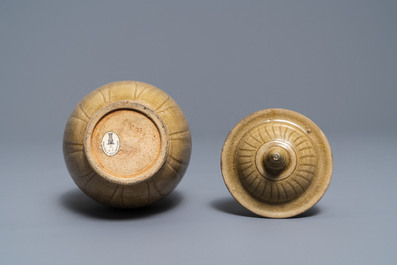 A Chinese brown-glazed vase and cover with incised design, Song