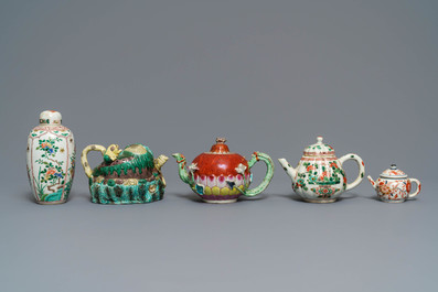 Four Chinese famille rose, verte and Imari-style teapots and a tea caddy, Kangxi and later