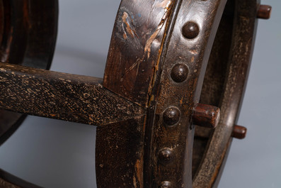 A Chinese carved hardwood stand with rootwood top, 19th C.