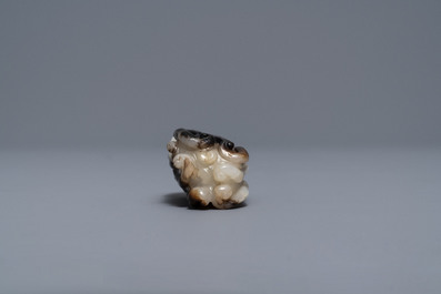 Three Chinese greyish white and black and white jade snuff bottles, 19/20th C.